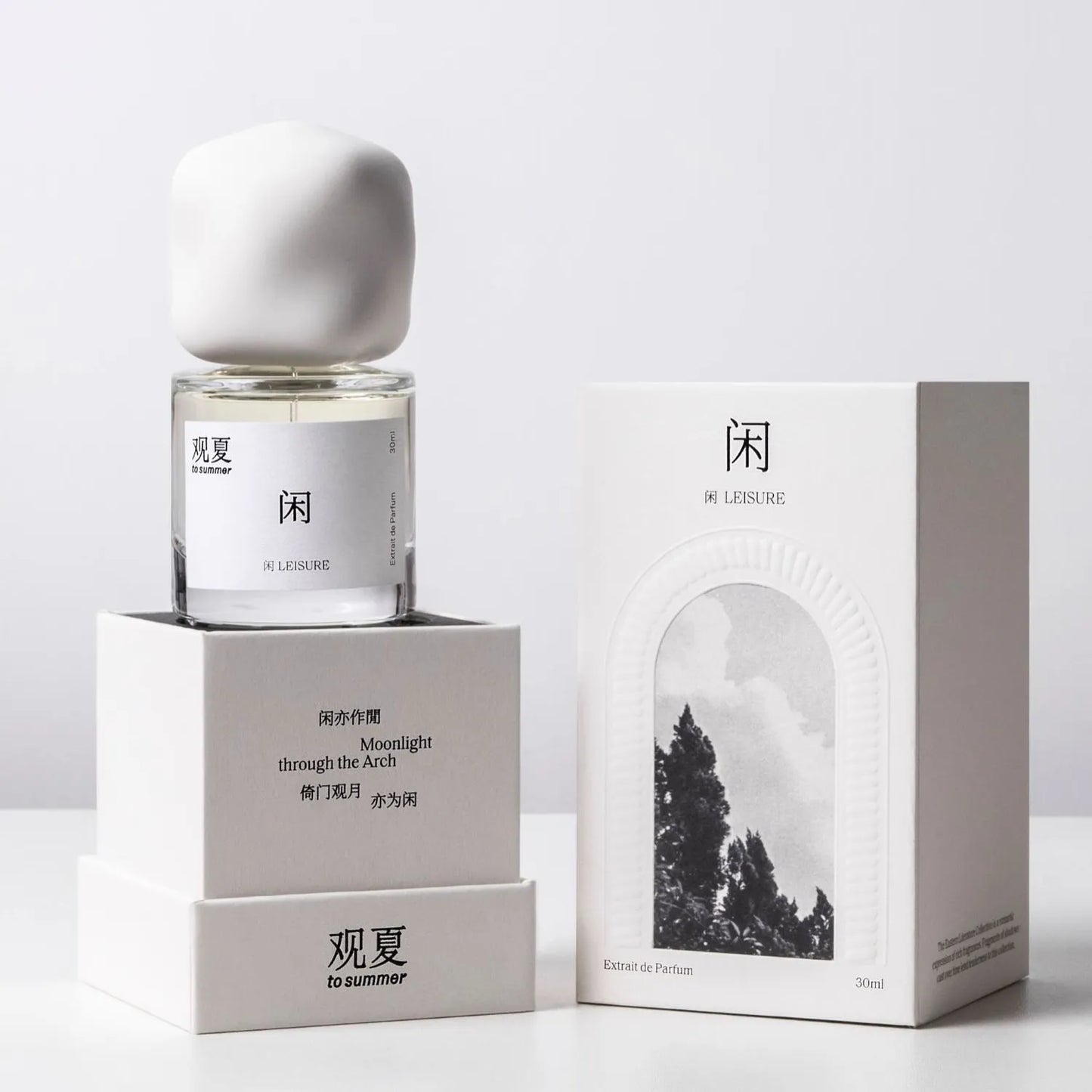 To Summer LEISURE perfume with white packaging box featuring Moonlight through the Arch concept art.