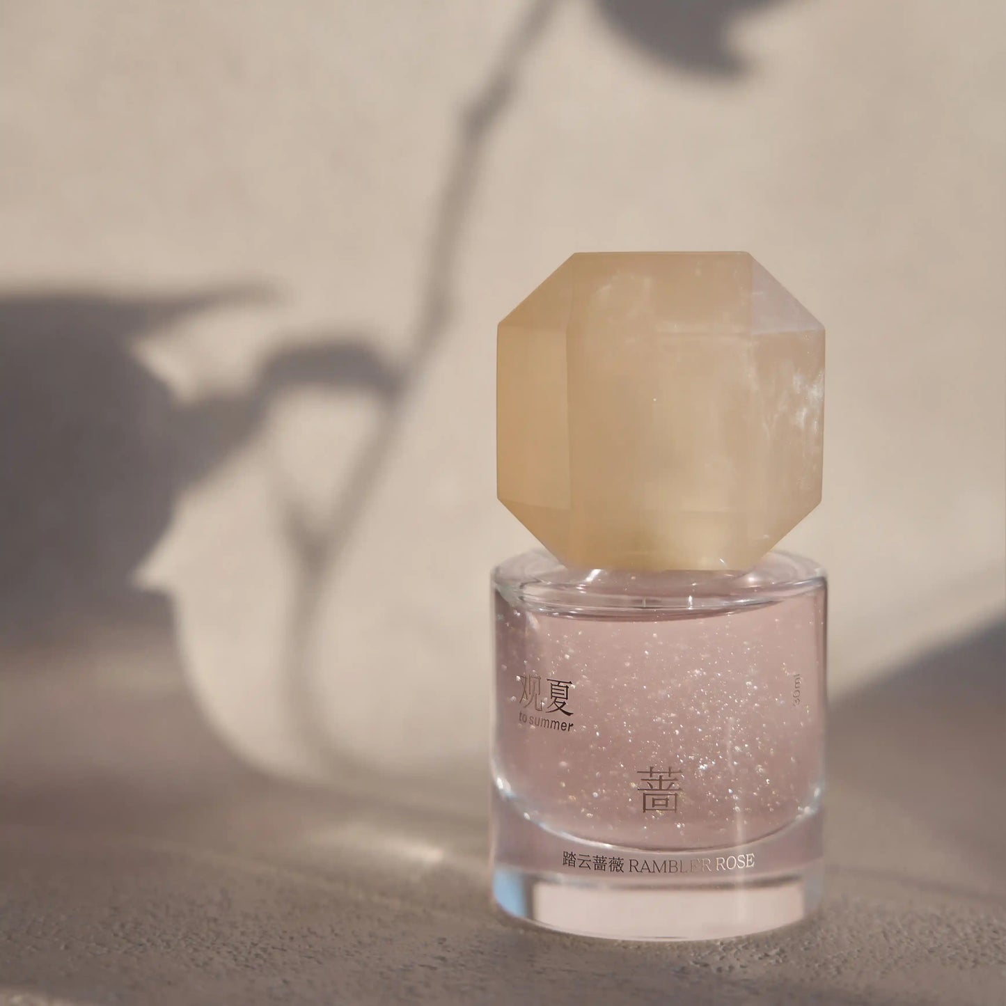 RAMBLER ROSE perfume bottle, a green woody floral rose fragrance with amber and musk notes