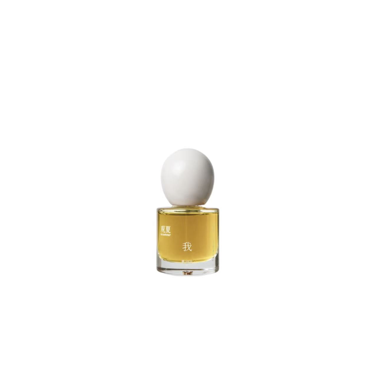 To Summer HER niche perfume bottle with white cap, offering a clean magnolia and musk scent.