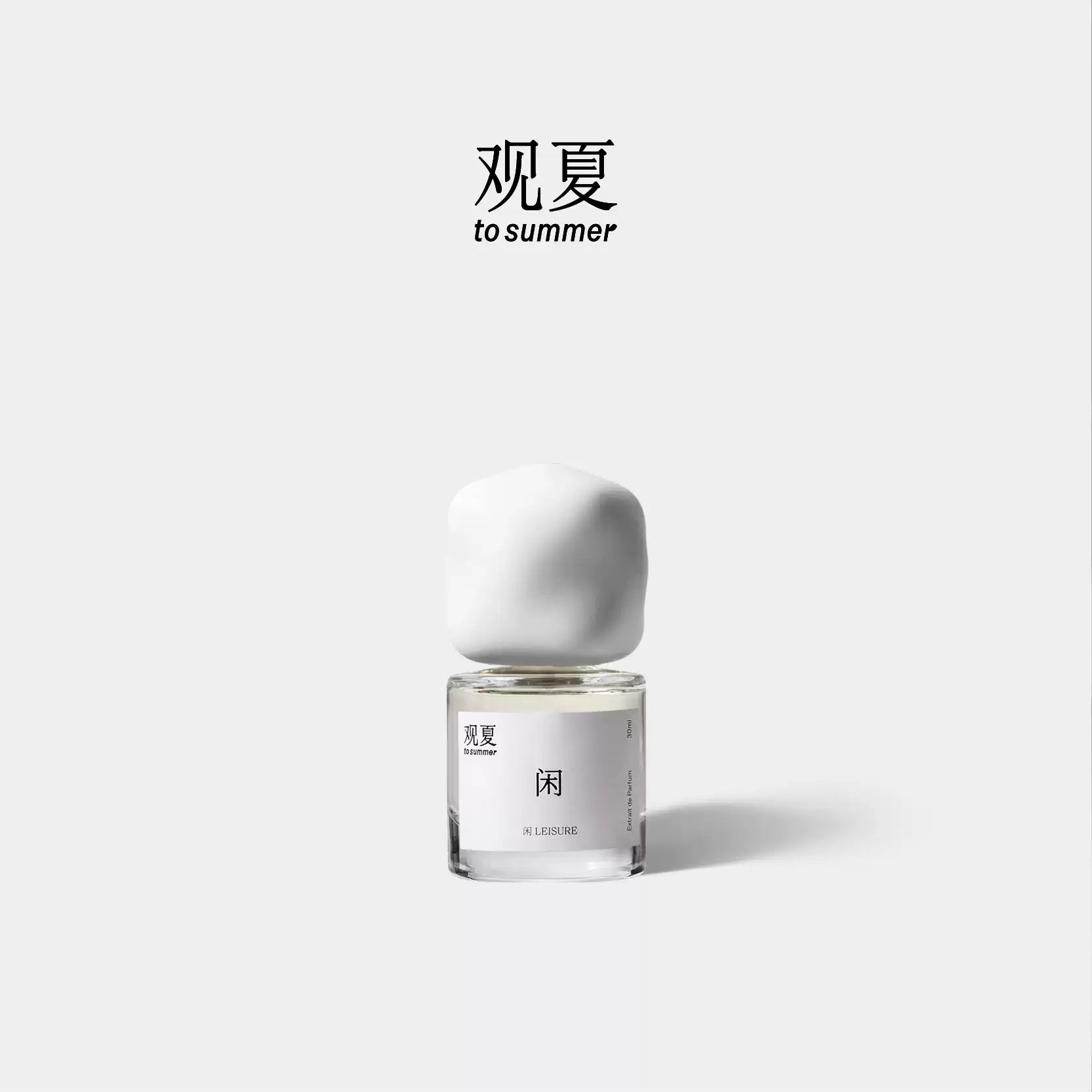 To Summer LEISURE niche perfume bottle with white cap, featuring a relaxing woody scent design.