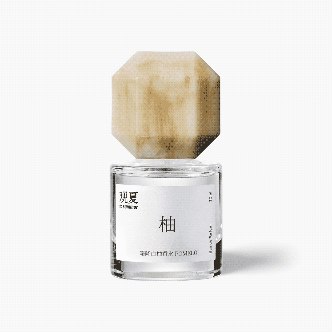 To Summer POMELO niche perfume bottle with beige marble cap, featuring a minimalist white citrus scent design.